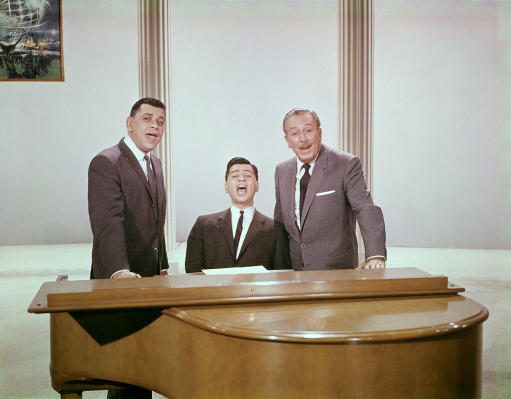 Walt and The Sherman Brothers together singing "it's a small world"